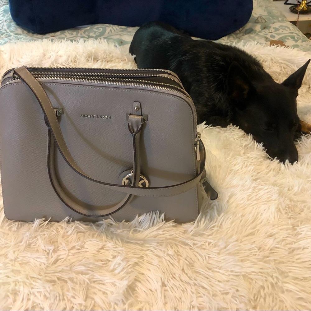 Gently used Michael Kors cross body bag/satchel.